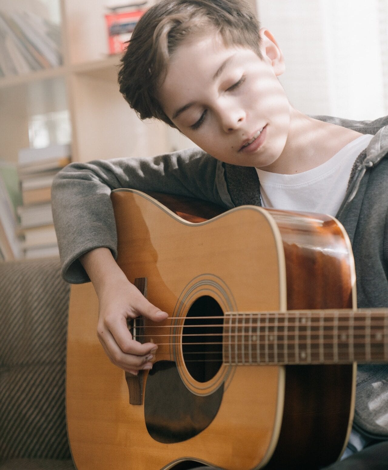 School pupil using music theory online